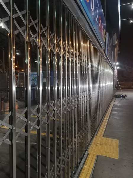 Reja plegable de acero inoxidable 304 - local comercial
